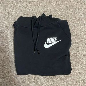 Black Nike hoodie.